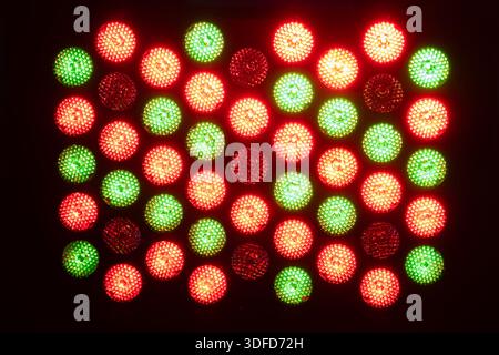 Close-up RGB LED light panel forming abstract red and green digital background for modern technology concepts Stock Photo
