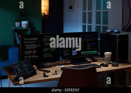 Young Man Working on Cybersecurity Programming at Night Stock Photo