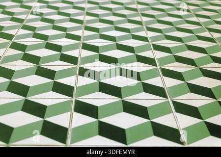 Perspective view of the floor of retro tiles. Repeating geometric patterns of dice on the floor of ceramic tile Stock Photo