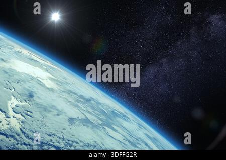 Planet Earth, Sun and Milky Way galaxy. View from a spacecraft with sunlight glinting on the ocean. Elements of this image furnished by NASA. Stock Photo