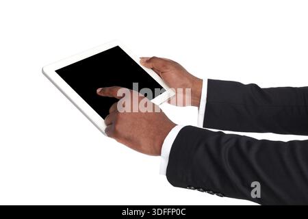 Holding and pointing to blank screen on tablet Stock Photo