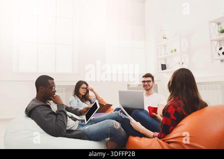 Students share opinions during break Stock Photo