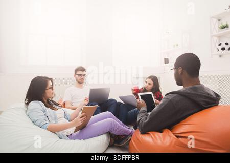 Students share opinions during break Stock Photo