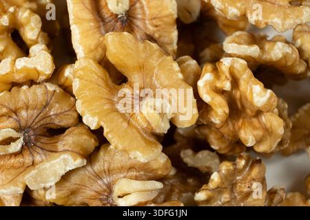 Close-up of peeled walnut kernels background. Stock Photo