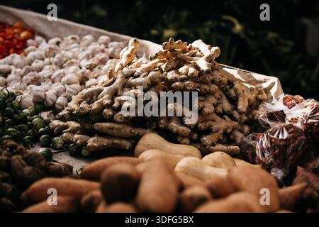 Fresh Seasonal Vegetables At Traditional Market Stall: Artichokes, Beans, Potatoes, And Root Vegetables Displayed In Abundant Mediterranean Food Marke Stock Photo