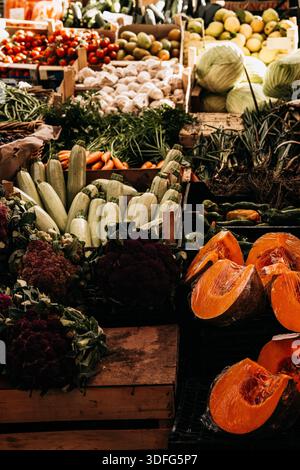 Fresh Seasonal Vegetables At Traditional Market Stall: Artichokes, Beans, Potatoes, And Root Vegetables Displayed In Abundant Mediterranean Food Marke Stock Photo
