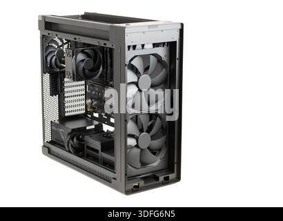 Side view  big tower, PC case, chassis,  inside motherboard, CPU, fan, SSD, memory, power supply unit with cables, isolated on white Stock Photo