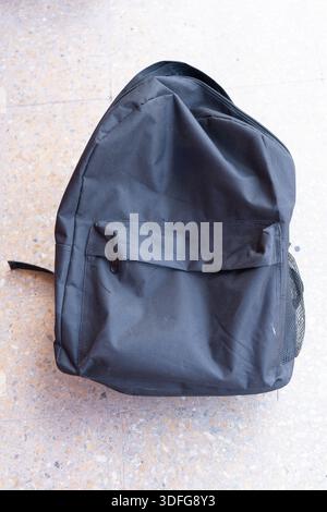 Black backpack. Isolated on a background. Stock Photo