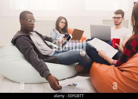 Students share opinions during break Stock Photo