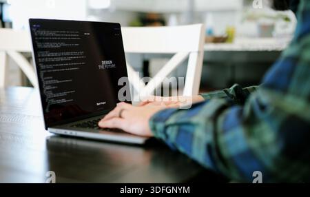 Middle Aged Coder Man Vibe Coding in Artificial Intelligence Infused Integrated Development Environment - Software Engineer Uses AI Based IDE Concept Stock Photo