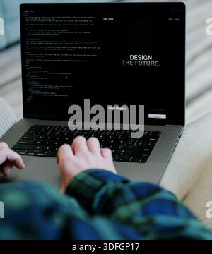 Middle Aged Coder Man Vibe Coding in Artificial Intelligence Infused Integrated Development Environment - Software Engineer Uses AI Based IDE Concept Stock Photo