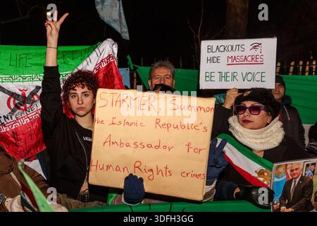 Iranian Embassy, London, UK. 12th January 2026. Activists and members of the Iranian community hold placards in front of the Iranian Embassy in London as reports of mass killings of protesters filter through, despite the communication blackout in Iran. The Government cut internet services and phone lines in Iran on the 8th Jan in an attempt to hide the extent of the protests and proof of mass killings reaching the wider world. Credit: Amanda Rose/Alamy Live News Stock Photo