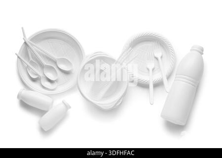 Different plastic tableware on white background Stock Photo