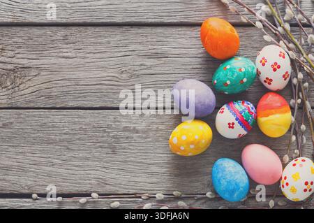 Festive Easter Eggs Arranged on a Rustic Wooden Surface With Delicate Branches Stock Photo