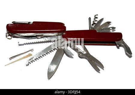Two multi-tool pocket army knifes, a compact, folding device that combines multiple functions (tools) into a single, portable unit, screwdriver, can o Stock Photo