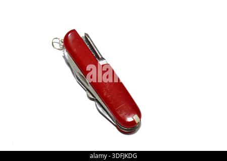 A multi-tool pocket army knife, a compact, folding device that combines multiple functions (tools) into a single, portable unit, screwdriver, can open Stock Photo
