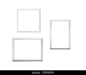 Frame set isolated on white background. Collection of three picture frames in vertical, horizontal and square formats, gallery wall arrangement for ar Stock Photo