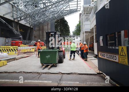 Construction workers in uniform carry out onsite works at a new railway station development in Brisbane, Queensland, Australia, January 2026. Stock Photo