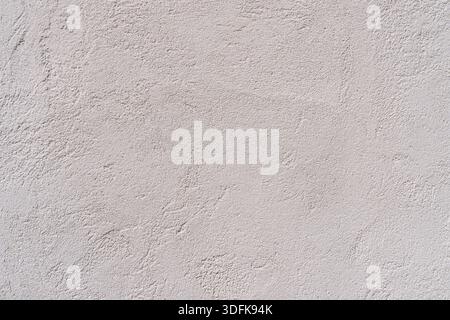 Texture of an old white plastered wall. Abstract construction background. Stock Photo