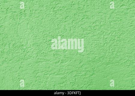 Texture of green rough plaster. Abstract design background. Stock Photo