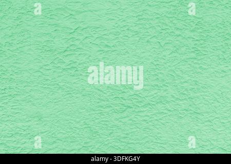 Texture of green rough plaster. Abstract design background. Stock Photo