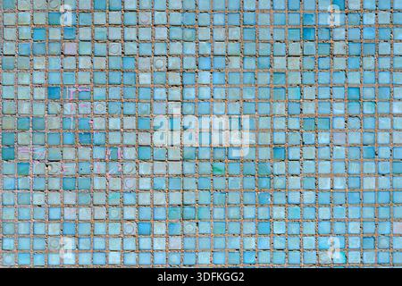 Wall of small blue tiles. Abstract design background. Stock Photo