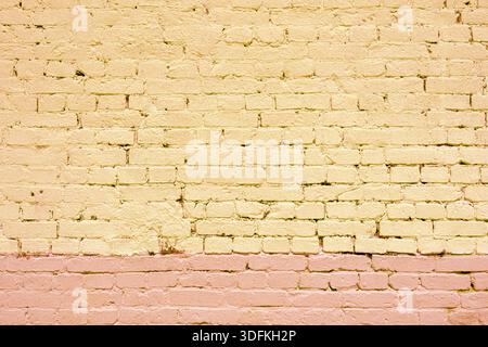 Old yellow brick wall. Abstract interior background. Stock Photo