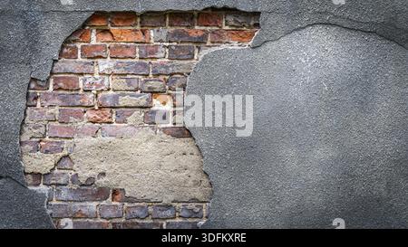 Rustic red corroded brick hole in a grey plaster wall. High quality texture and background for your projects and creative work Stock Photo