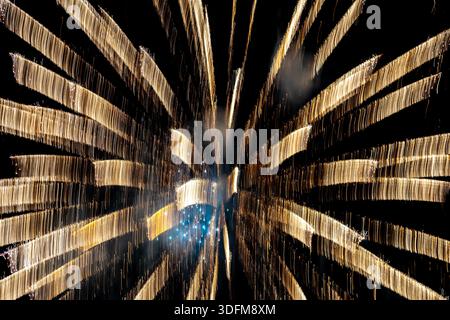 vibrant light trails, firework burst, long exposure Stock Photo