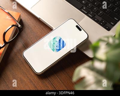 IOS 26 logo is displayed on the screen of a smartphone, in Bangalore, India, on January 14, 2026 Stock Photo