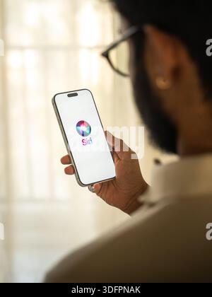 Siri logo is displayed on the screen of a smartphone, in Bangalore, India, on January 14, 2026 Stock Photo