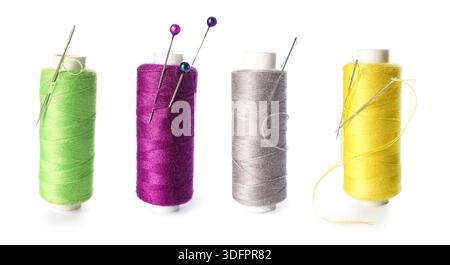 Set of colorful thread spools on white background Stock Photo