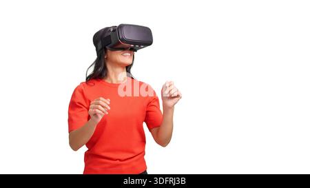 Woman experiencing virtual reality wearing VR headset Stock Photo