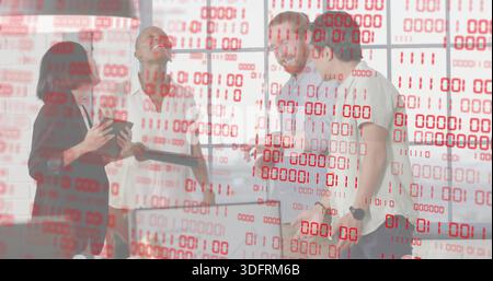 Collaborating four colleagues in business-casual attire at office, using laptop, tablet, red binary Stock Photo