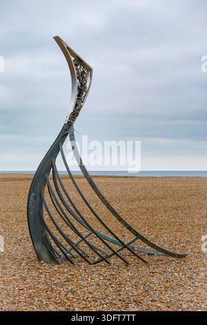 Modern Metal Sculpture on Pebble Beach by the Sea in Hastings, East Sussex Stock Photo