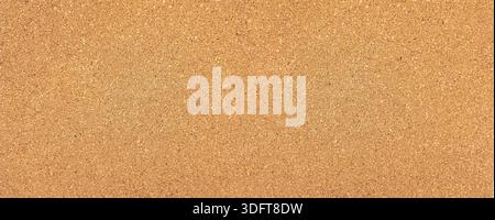 Cork material showing a grainy texture suitable for background use Stock Photo