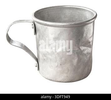 Scratched metal cup, perfect for outdoor activities or rustic design projects Stock Photo