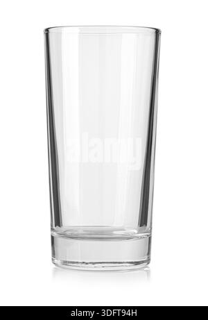 Tall transparent glass highball tumbler standing on a reflective white surface Stock Photo