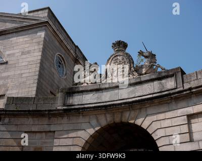 The symbolic lion and unicorn, the Royal Coat of Arms, a foundation stone in the stonework entrance to King's Inn in Dublin city, Ireland. Stock Photo