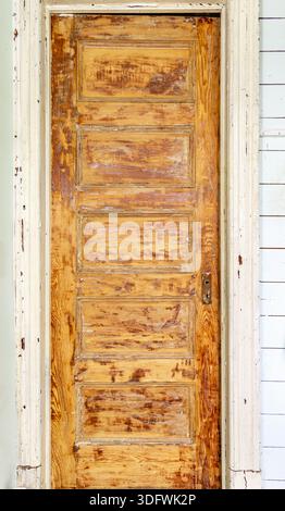 detail of an old distressed wooden door Stock Photo