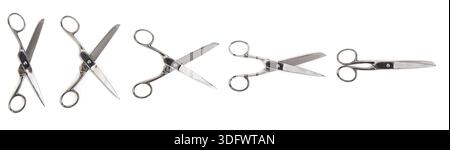 Scissors in different positions open wide to closed isolated on white Stock Photo