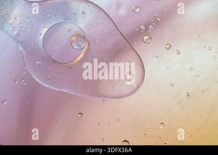 Oil drops in water. Defocused abstract psychedelic pattern image pastel colored. Abstract background with colorful gradient colors Stock Photo