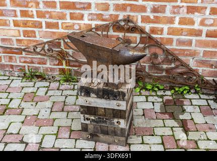 Vintage rusty blacksmith anvil for iron work Stock Photo