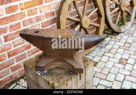 Old rusty blacksmith anvil for iron work Stock Photo