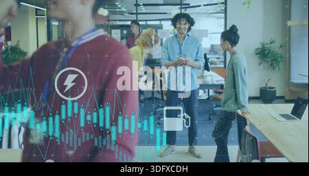 Talking man with curly hair holding phone, wearing blue shirt in office with waveform bars Stock Photo