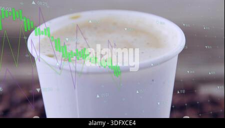 Displaying white paper cup showing frothy foam and drip at cafe counter, with financial overlay Stock Photo