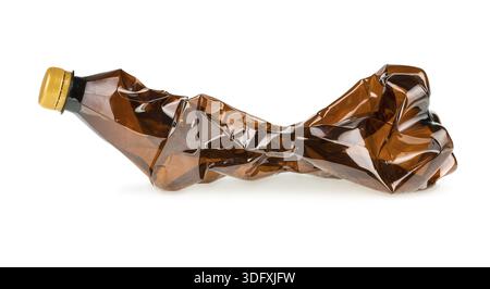 Crumpled brown plastic bottle isolated on white background Stock Photo