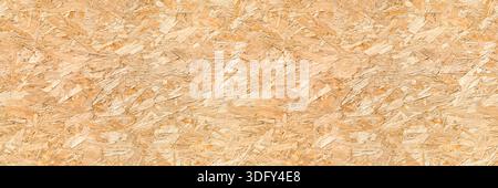OSB Oriented strand board wood house seamless background texture – pattern of flat fibreboard building panel. Wooden chip construction material. Stock Photo