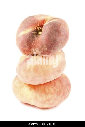 Three chinese flat peaches isolated on white background Stock Photo