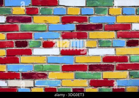 Colorful brick wall from multi colored bricks as a creative background texture Stock Photo